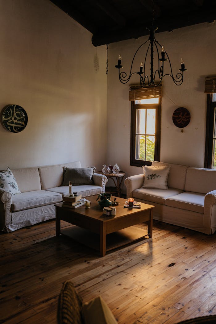 Inviting living room with rustic elements, soft lighting, and elegant decor, perfect for relaxation.
